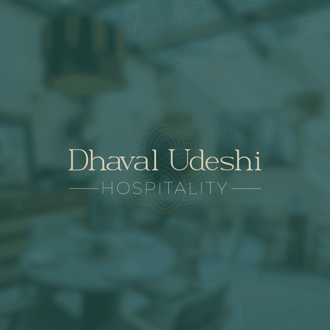Dhaval Udeshi Hospitality — brand logo over a restaurant interior